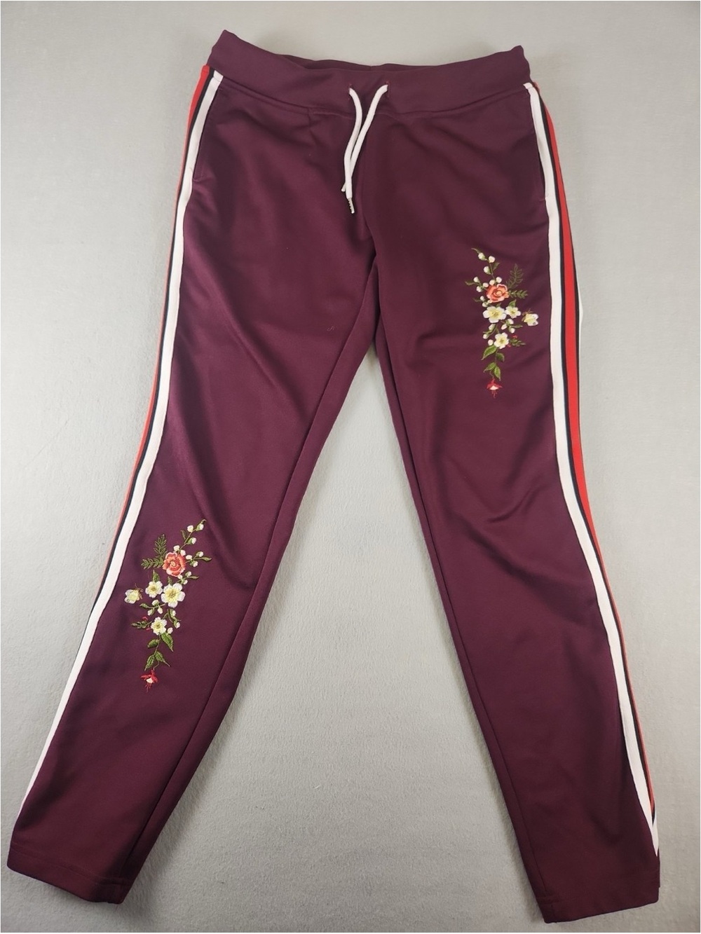 Kids Burgundy Floral Track Pants with Side Stripes